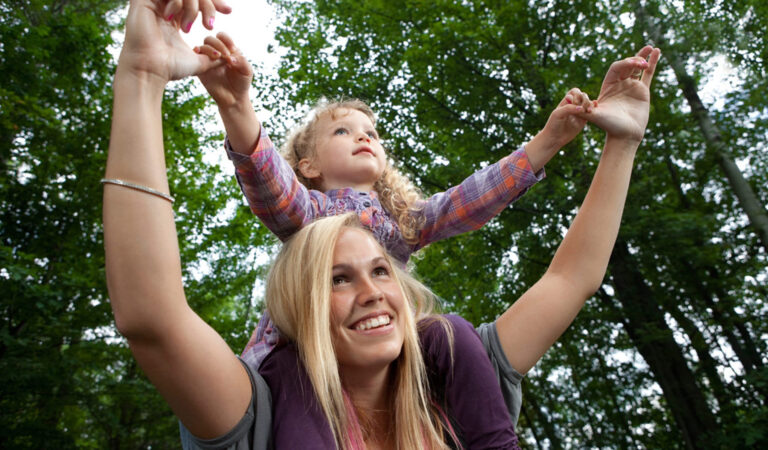 Woman with Child on Shoulders